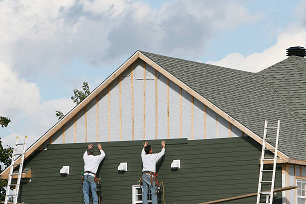 Professional Siding Replacement technician working in Cairnbrook, PA